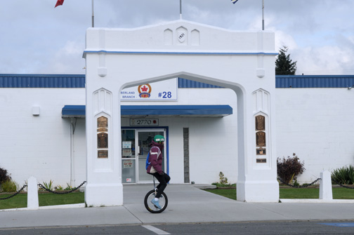 Unicyclist and Legion Branch #28, Cumberland, BC 2011 